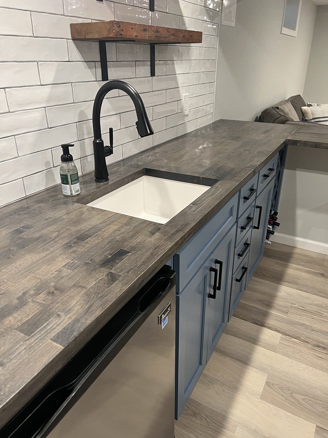 Built-in entertainment center and storage in finished basement