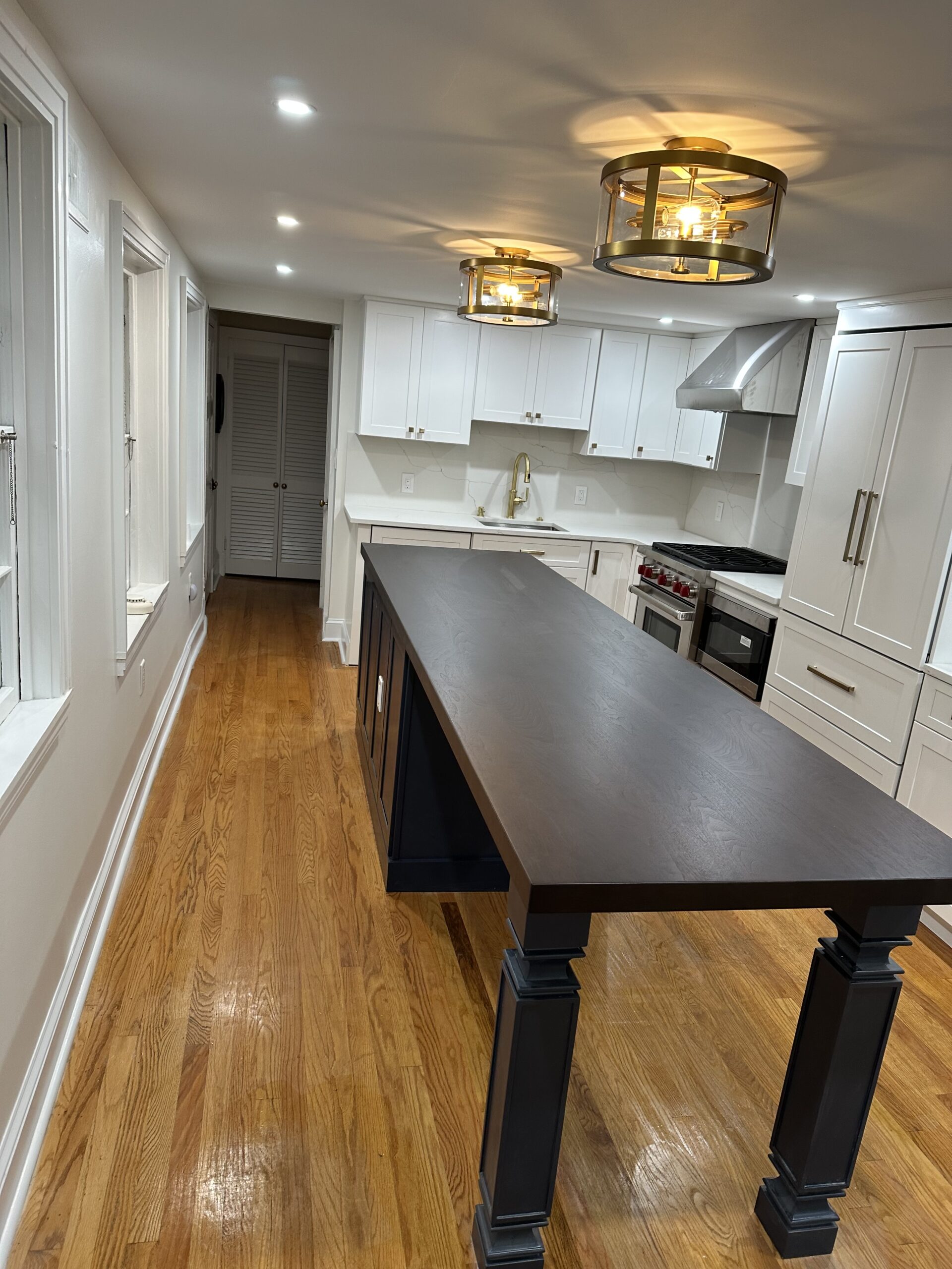 Transforming Kitchen with New Cabinets, Countertops, & Lighting Fixtures